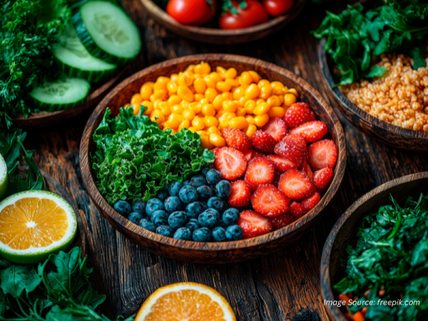 Colourful bowl of whole foods supporting gut health and skin health